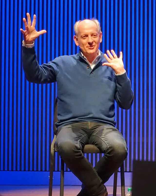 Stuart Russell, author of ‘Artificial Intelligence and the Problem of Control,’ is portrayed in a setting that underscores the book’s theme on AI’s potential dangers